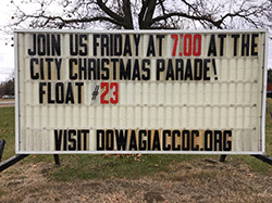 Our sign on the street says, JOIN US FRIDAY AT 7:00 AT THE CITY CHRISTMAS PARADE! FLOAT #23.
