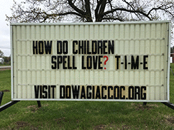 Our sign on the street says, HOW DO CHILDREN SPELL LOVE? T-I-M-E!