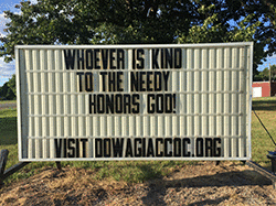 Our sign on the street says, WHOEVER IS KIND TO THE NEEDY HONORS GOD!